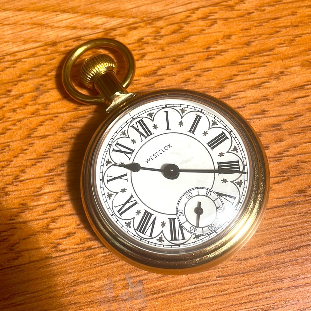 Westclox gold stop watch.